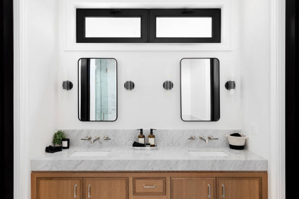 istock A cozy bathroom with a wood cabinet. 1449471403