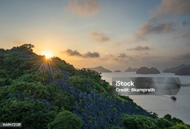 Vibrant Sunset Over The Tropical Paradise Of Cat Ba Island Vietnam In Lan Ha Ha Long Bay In Southeast Asia Stock Photo - Download Image Now