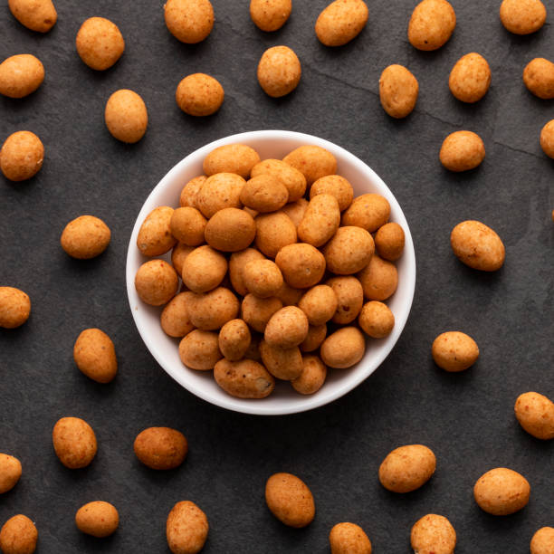 istock Arachis hypogaea - Organic mexican peanuts in the bowl 1449476669