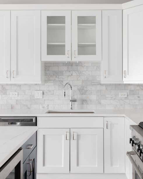 istock A kitchen sink detail shot in an all white kitchen. 1449481263