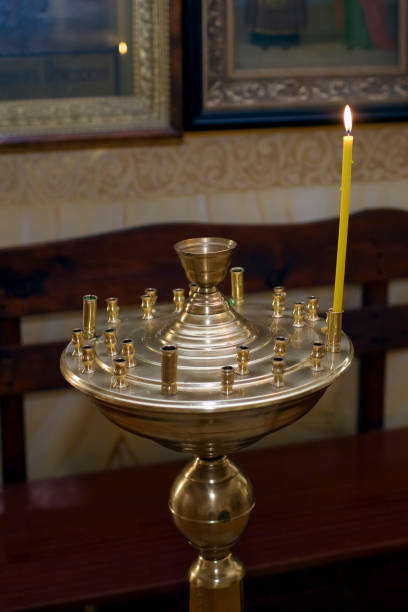 istock One candle burning in an Orthodox church 1449483713