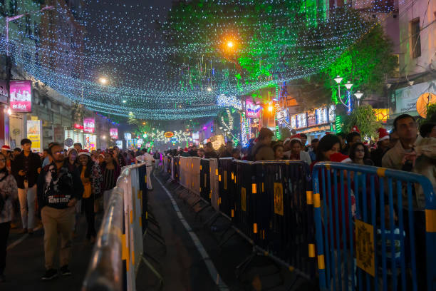 Decorated lights and Christmas celebration at illuminated Park street with joy and year end festive mood. stock photo