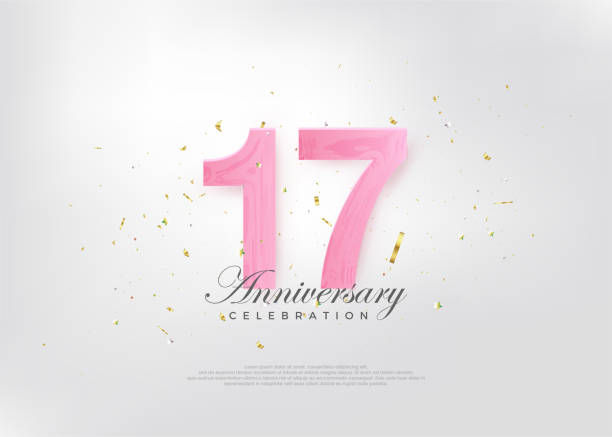 istock 17th anniversary celebration, with beautiful pink numbers and very charming. 1449503412