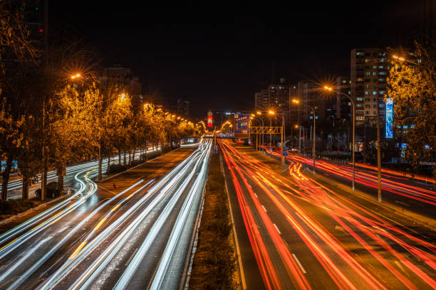 istock night road traffic light track 1449505845