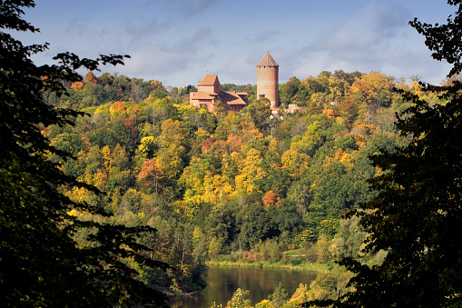 Forest view of Turaida Castle and a lake in Latvia