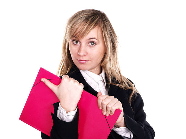 Smiling woman with pink folder on her hand stock photo