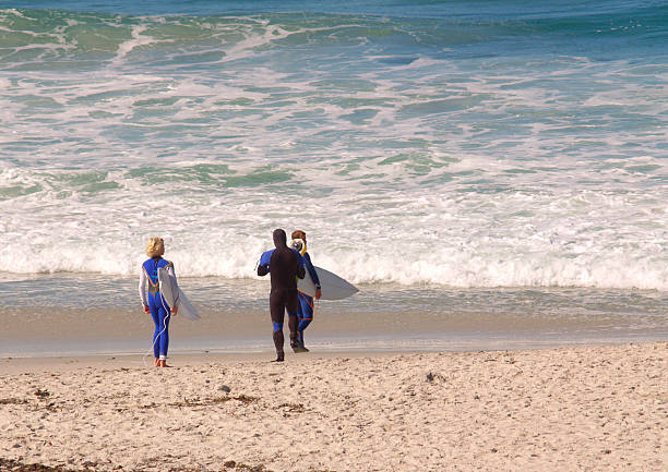 istock Surfers into the water 144950863