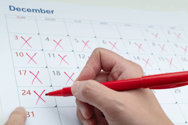 istock Calendar page with cross shape 1449518744