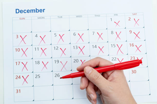 istock Calendar page with cross shape 1449518748