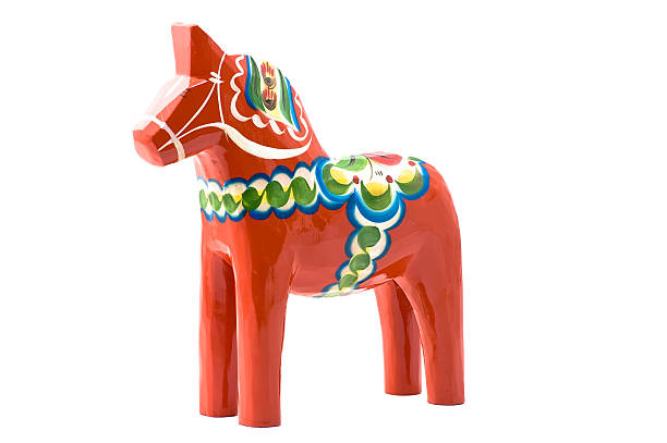 Traditional swedish Dala horses in souvenir shop of Stockholm