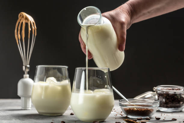 istock Iced Dalgona Coffee. Coffee making. Barista prepares whipped foam from instant coffee. Trendy drink latte 1449521092