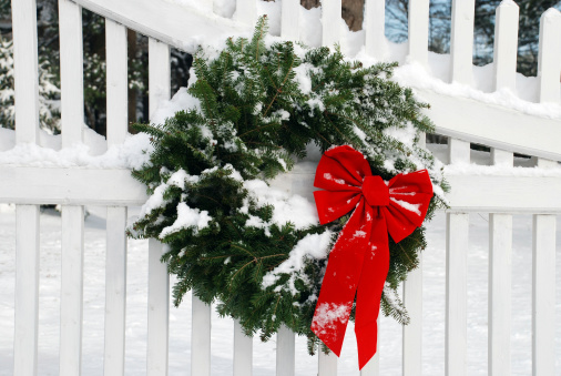 Christmas Wreath on Fence with Snow