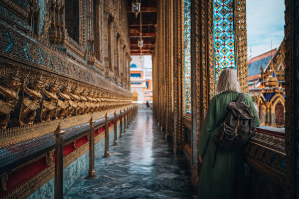 istock Woman Exploring The Grand Palace in Bangkok 1449522521