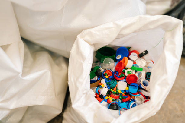 istock Close-up top view of bag with various plastic waste sorting for further disposal at private waste recycling plant. 1449523402