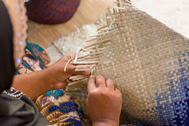 Craftsmen weaving Toei Panan. A southern craft product that has transformed Toei Panan into a lifestyle product. stock photo