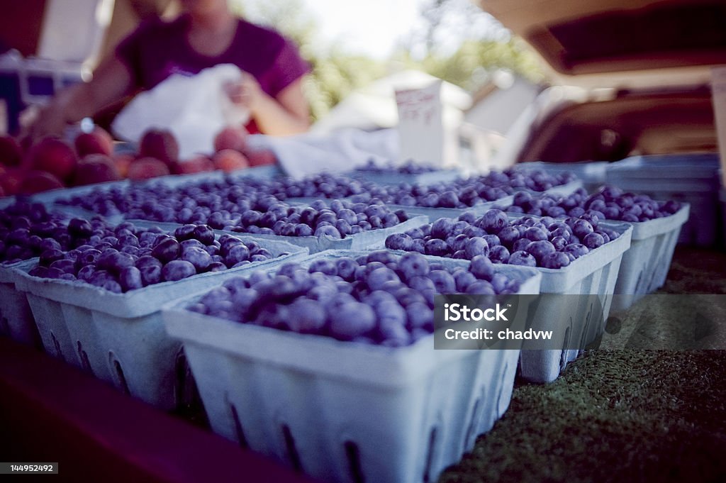 blueberries blue berries in baskets at the farmers market Agricultural Fair Stock Photo