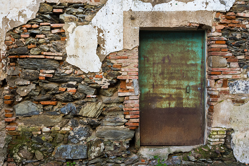 Door in broken wall