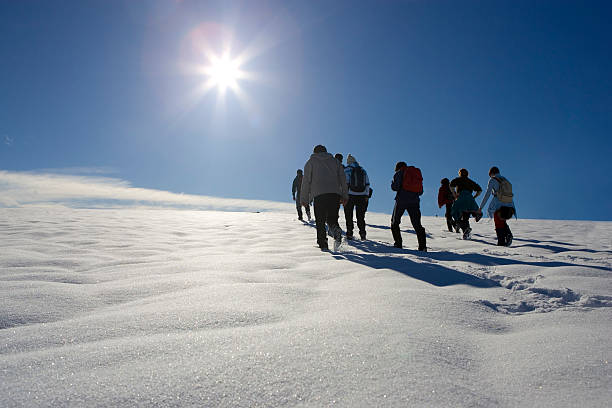 istock People in the snow 144952840