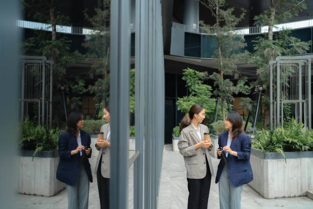 istock Office workers sip coffee in the morning before going to work in the office. 1449530547