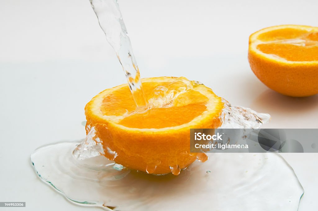 Laranja com faíscas de água - Royalty-free Amarelo Foto de stock