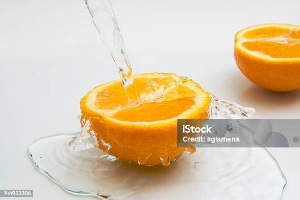 Laranja Com Faíscas De Água - Fotografias de stock e mais imagens de Amarelo - Amarelo, Bebida, Bolha - Estrutura Física