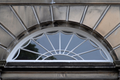 Traditional fan light above doorway of a door No 13, Edinburgh