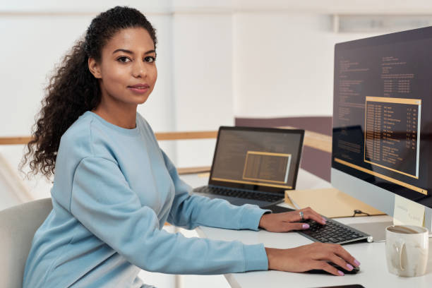 istock Female rogrammer working on computer in modern office of IT company 1449534407
