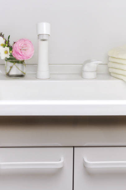 istock Washing Stand with Buch of Flowers 1449535263