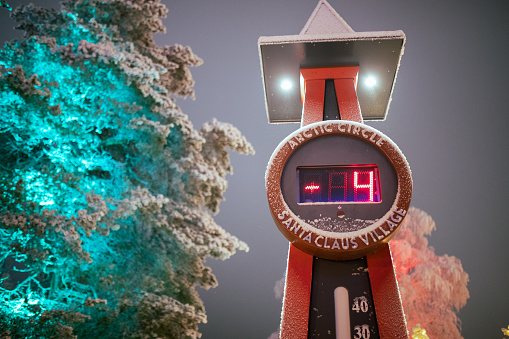 Temperature meter at Santa Claus Village shows a temperature of minus 4 degrees