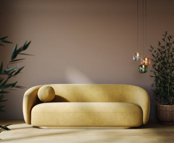 istock Modern interior design with yellow sofa and brown empty mock up wall background 1449540983