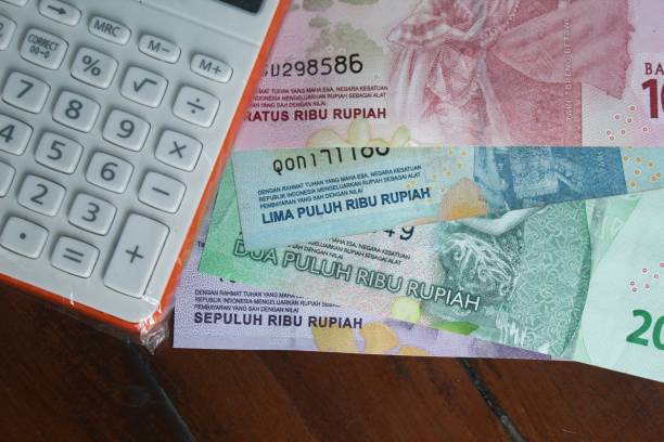 istock lots of rupiah on the table 1449542459