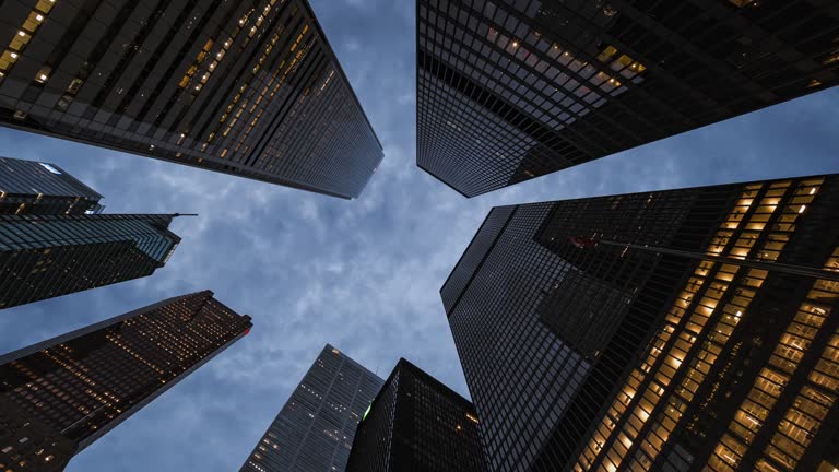 Business Finance and Economy, Zoom Out Timelapse View Looking Up at Modern Office Buildings in the Financial District, Toronto, Ontario, Canada