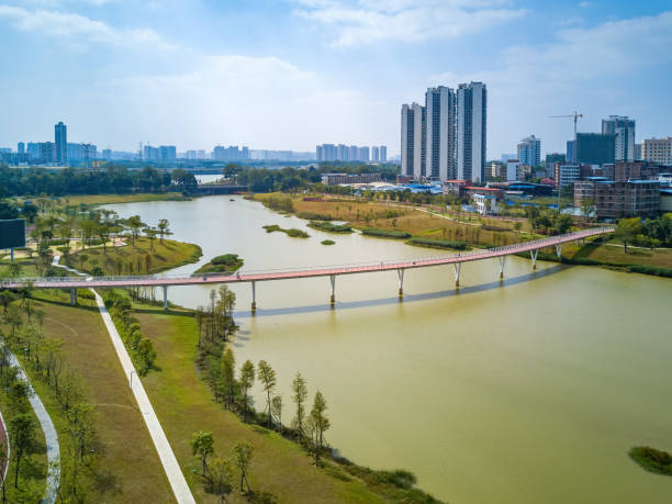istock A pedestrian rainbow bridge over the city river 1449545712