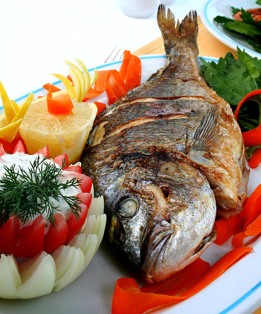 grilled fish stock photo