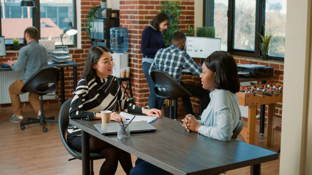 istock Asian employee interviewing african american candidate 1449558932
