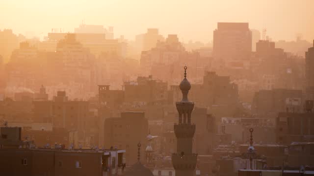 View Of The Houses Of A Big Muslim City In The Back Light Of The Evening Sun