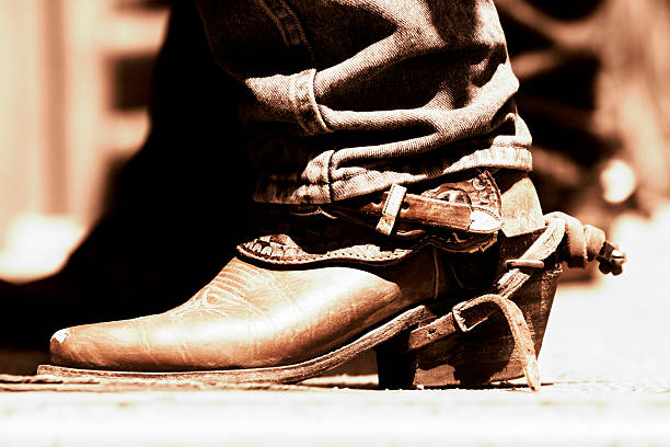 istock Rodeo Cowboy Boot & Spur - Copper Tone 144956154