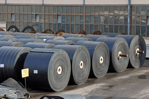istock New industrial conveyor belts packed in rolls. 1449562877