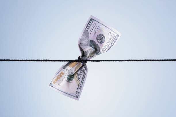 istock One Hundred Dollar Banknote Tied Up 1449564227