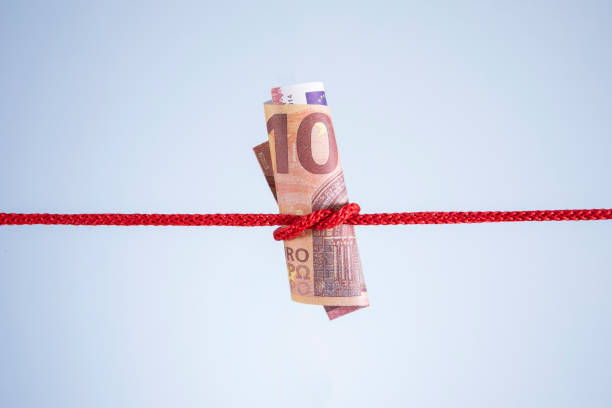 istock Ten Euro Banknote Tied Up 1449564777