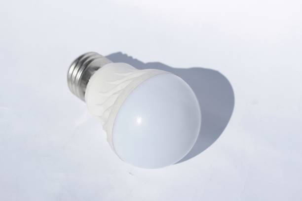 istock close up of white LED light bulb isolated on white background. 1449570061
