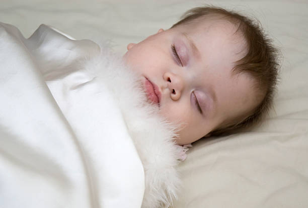 Girl in bed stock photo