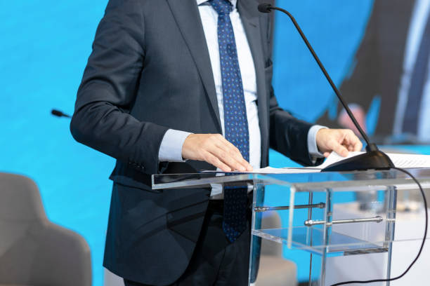 istock Speaker at business conference or presentation. Public speaking concept. 1449574325