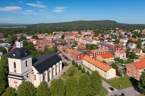 Aerial view of the town of Säter in the Dalarna region of Sweden. In the foreground is Säter church from the 18th century.