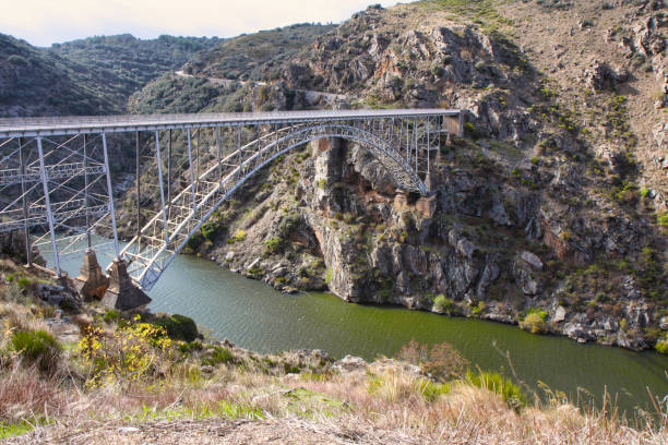 istock PIno bridge over Douro river, also known as Requejo iron Bridge, Castile and Leon, Spain Arribes del Duero 1449575728