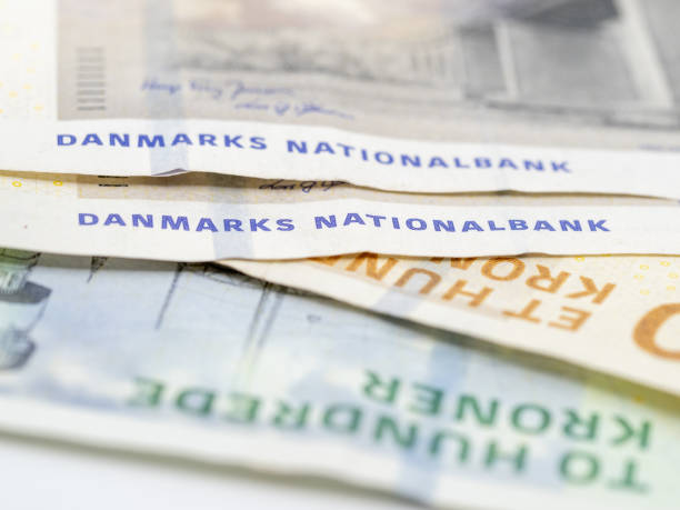 istock closeup of danish banknotes on white background 1449578682
