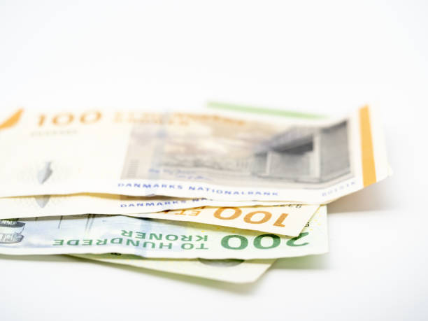 istock Banknotes of Danish currency kroner on a white background 1449578876