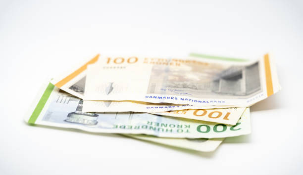 白い背景にデンマークの紙幣 - danish currency ストックフォトと画像