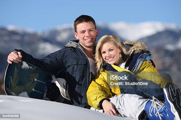 Happy Couple At Ski Resort Stock Photo - Download Image Now - 2000-2009, Adult, Adults Only