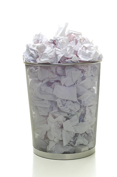 istock Water basket overflowing with white papers 144958290